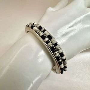 Black and white beaded hinged bangle bracelet